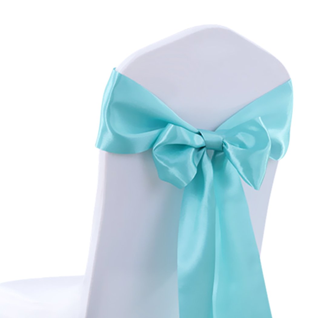 20 satin chair sashes in various colors elegantly draped over chairs, perfect for weddings and events.
