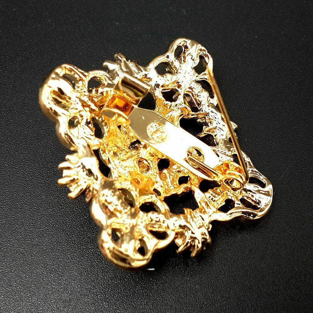 A collection of 24 vintage-style brooches featuring mixed alloy and rhinestone crystals, showcasing various floral designs.