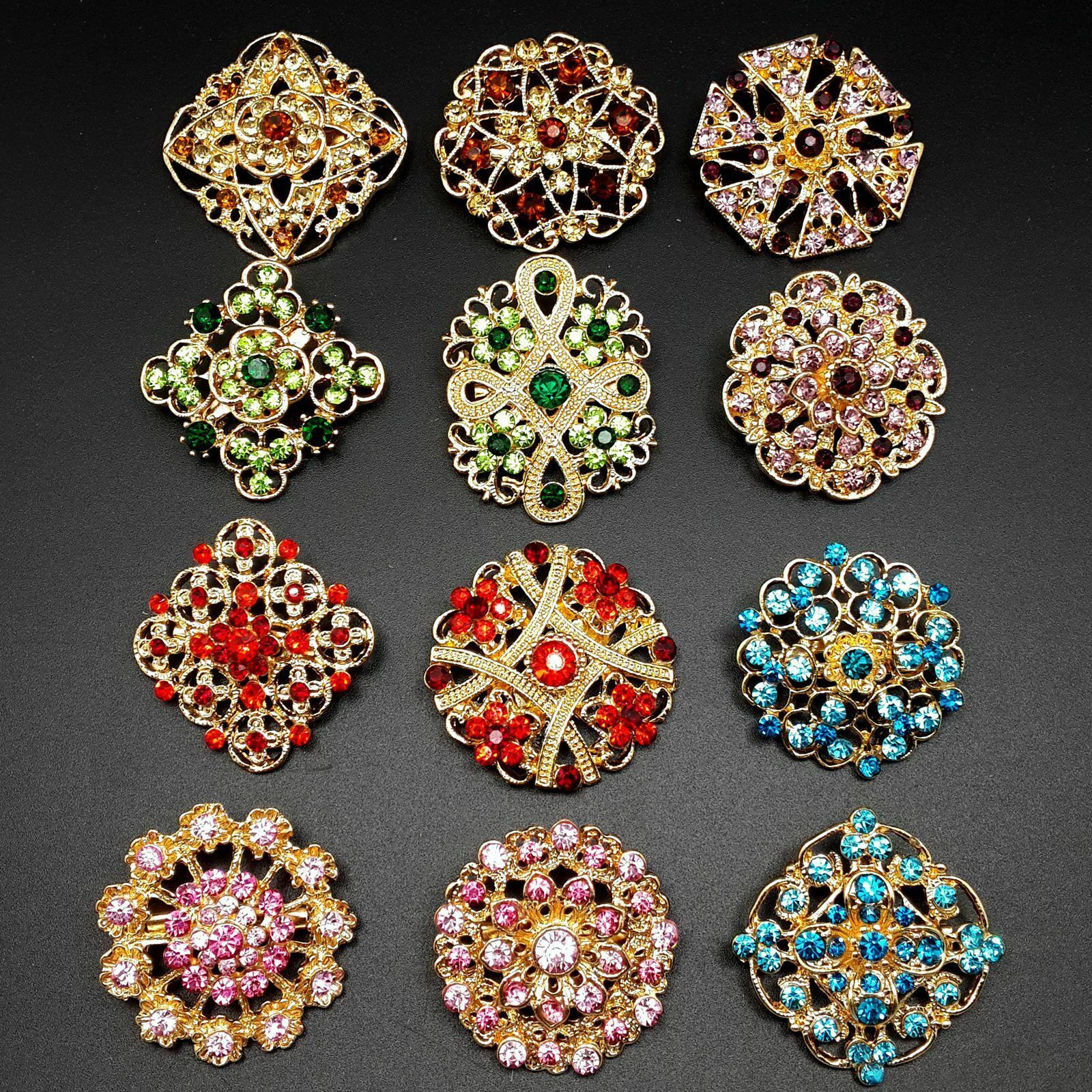 A collection of 24 vintage-style brooches featuring mixed alloy and rhinestone crystals, showcasing various floral designs.