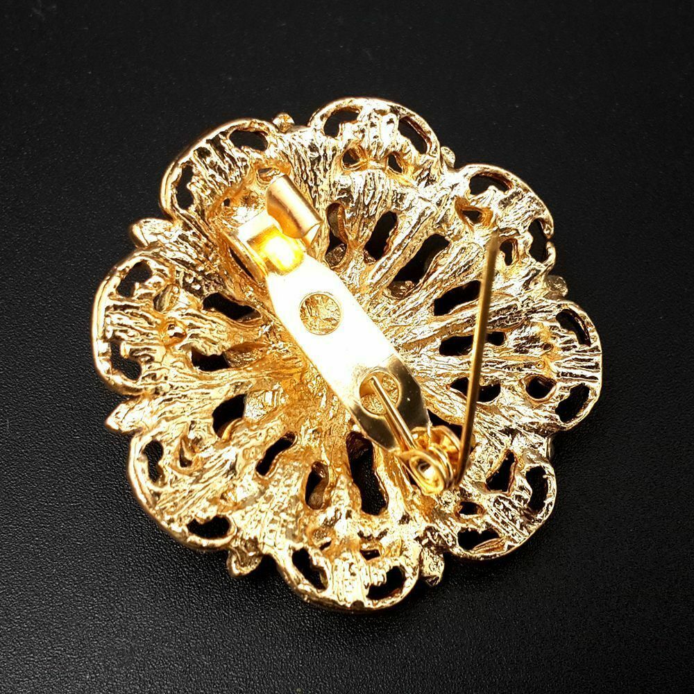A collection of 24 vintage-style brooches featuring mixed alloy and rhinestone crystals, showcasing various floral designs.