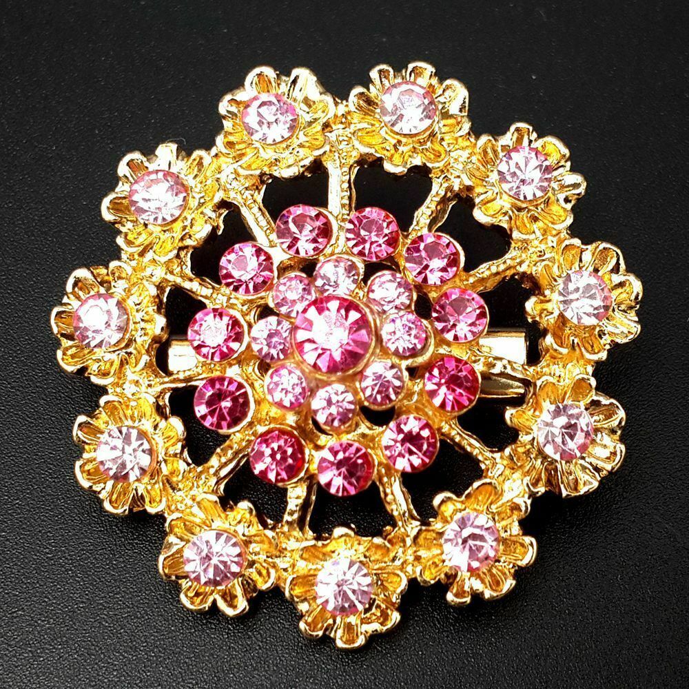 A collection of 24 vintage-style brooches featuring mixed alloy and rhinestone crystals, showcasing various floral designs.