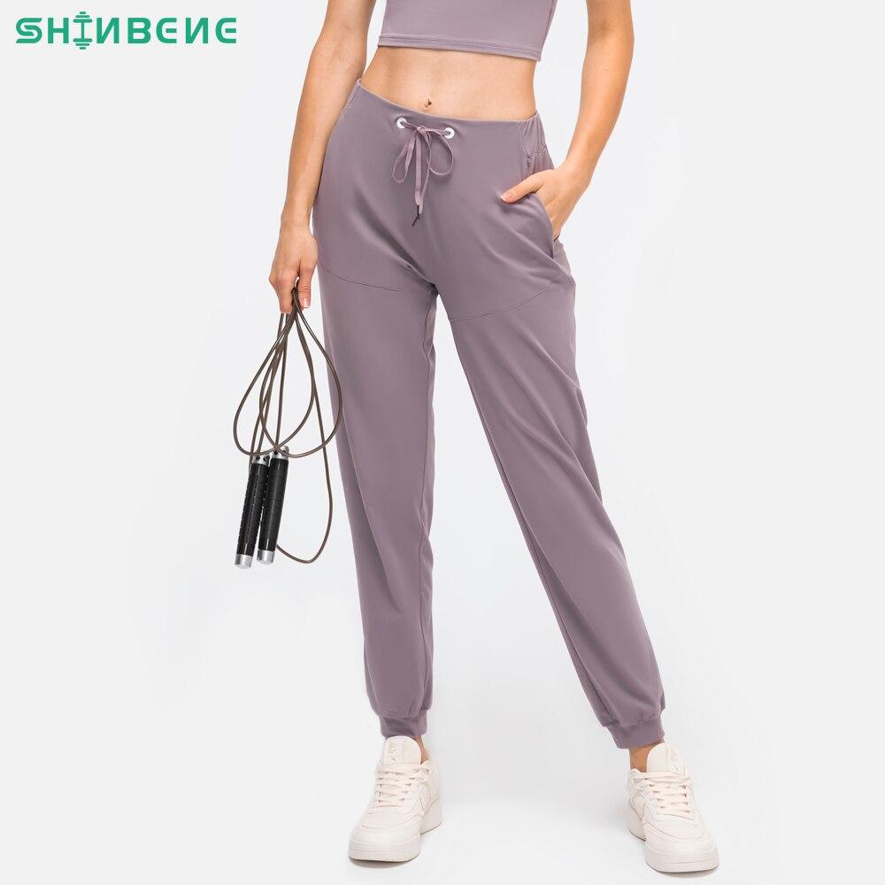 28-inch Naked Feel Drawstring Workout Gym Joggers for women, featuring a cozy nylon-spandex blend and adjustable drawstring.