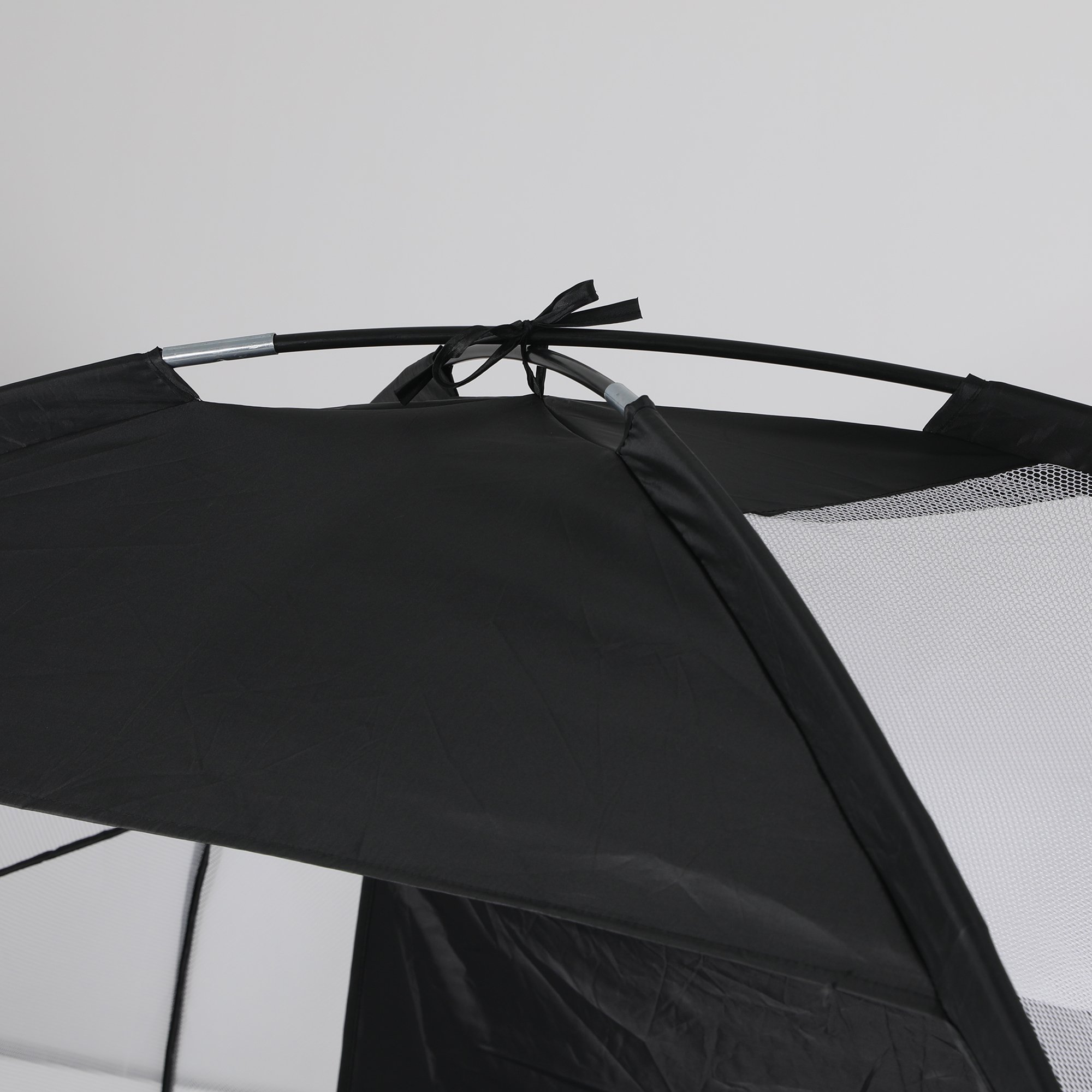 2M Golf Practice Net set up in a backyard, showcasing its ultra-wide design and sturdy construction with a target.