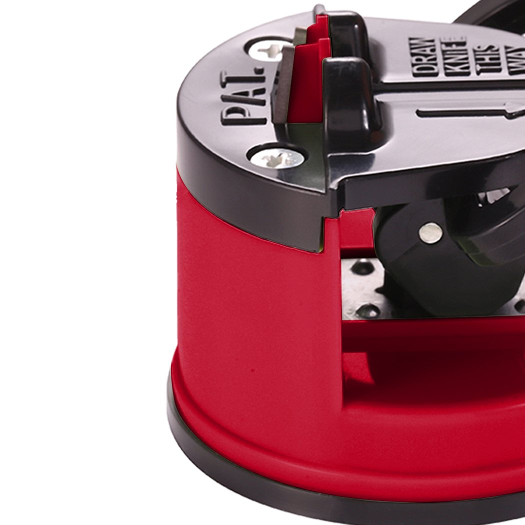 Two red kitchen knife sharpeners with suction base and tungsten carbide plates, designed for safe and effective sharpening of knife blades.
