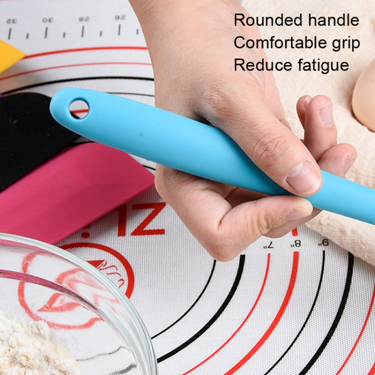 Two large integrated silicone scrapers with rounded handles, ideal for mixing chocolate and cream in the kitchen.