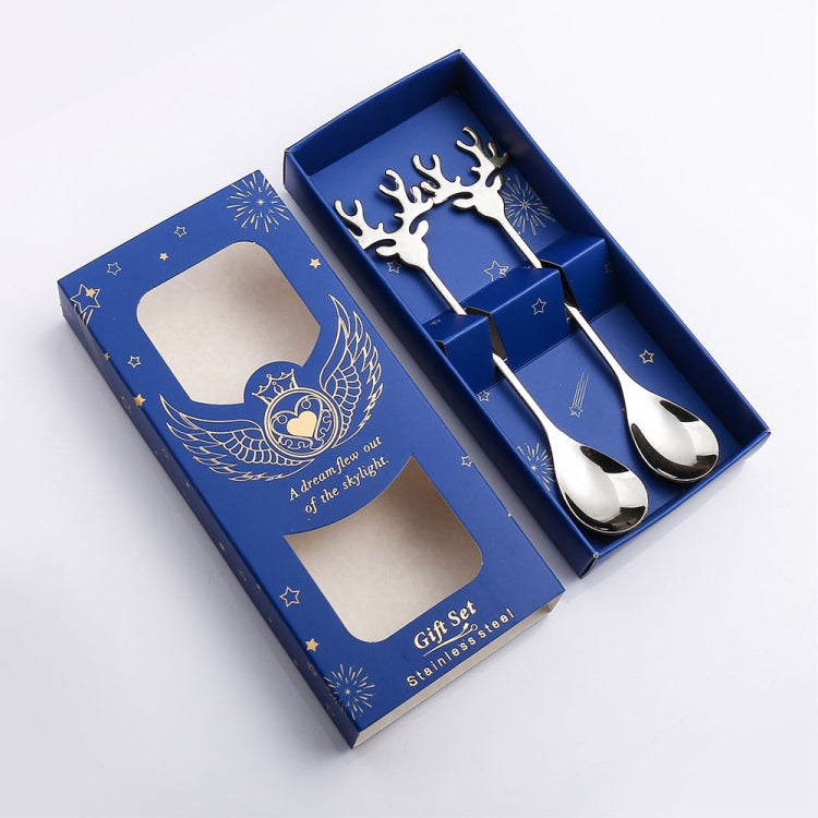 Two Christmas-themed 304 stainless steel deer stirring spoons, featuring a shiny finish and festive design, perfect for holiday beverages.