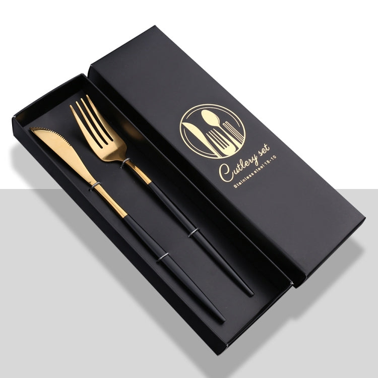 2pcs Stainless Steel Glossy Mirror Flatware Gift Set displayed elegantly on a table, showcasing its shiny finish and ergonomic design.