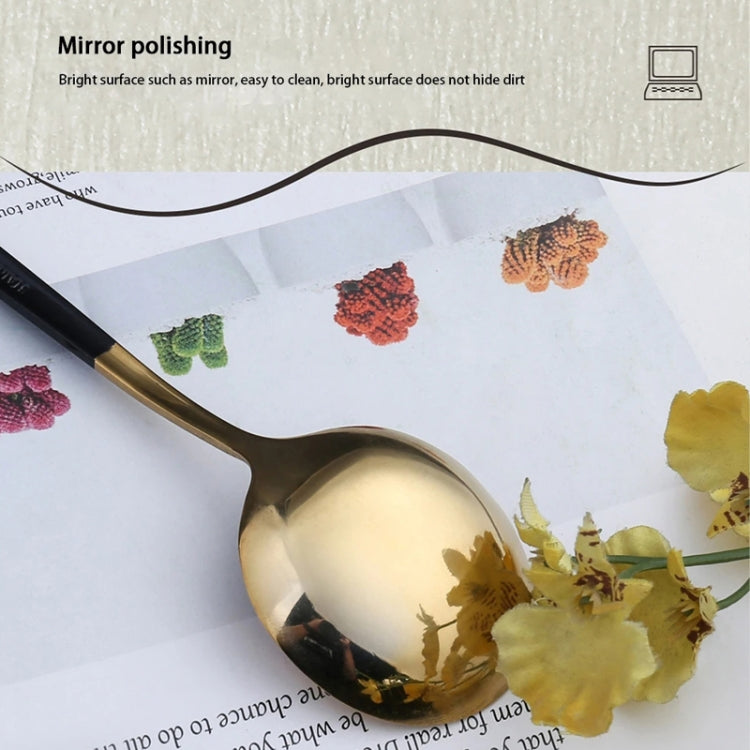 2pcs Stainless Steel Glossy Mirror Flatware Gift Set displayed elegantly on a table, showcasing its shiny finish and ergonomic design.