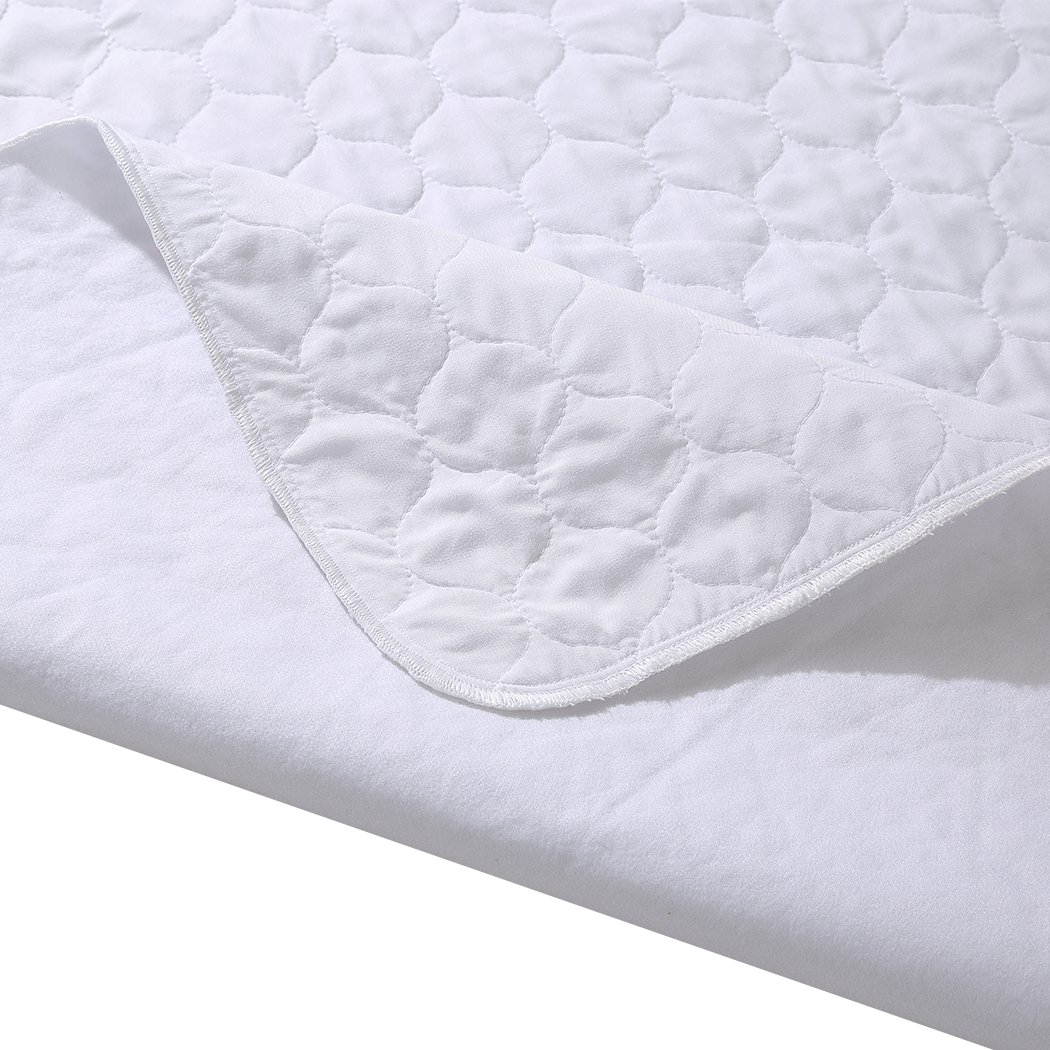 DreamZ Bed Pad, a waterproof and absorbent bed protector, featuring a smooth surface and breathable fabric, ideal for incontinence needs.