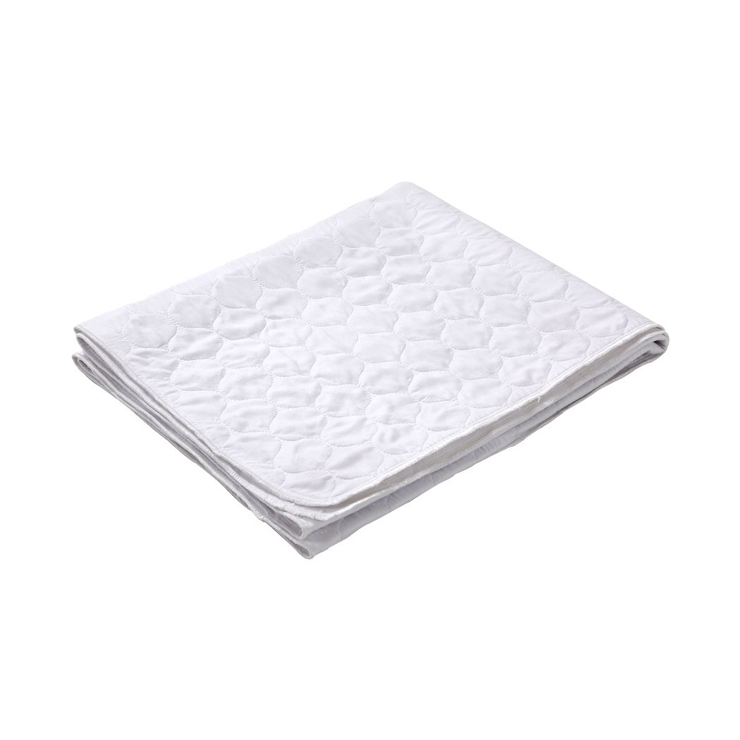 DreamZ Bed Pad, a waterproof and absorbent bed protector designed for incontinence, featuring a smooth surface and breathable fabric.