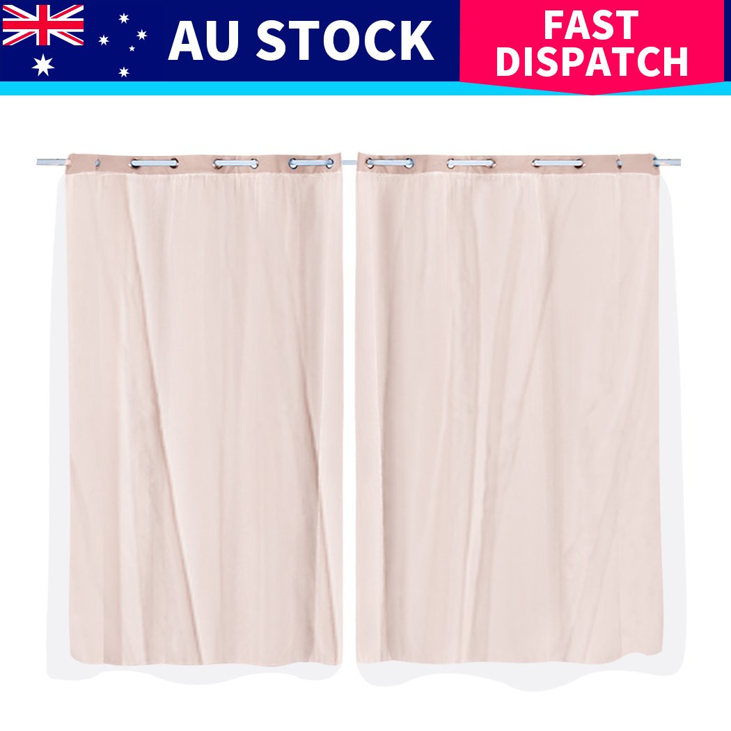 Two elegant blockout curtain panels with gauze, showcasing a stylish grommet top design, perfect for room darkening.