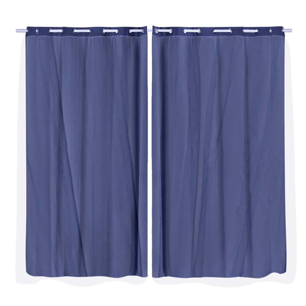 Two elegant blockout curtain panels with gauze, designed for room darkening and stylish decor.