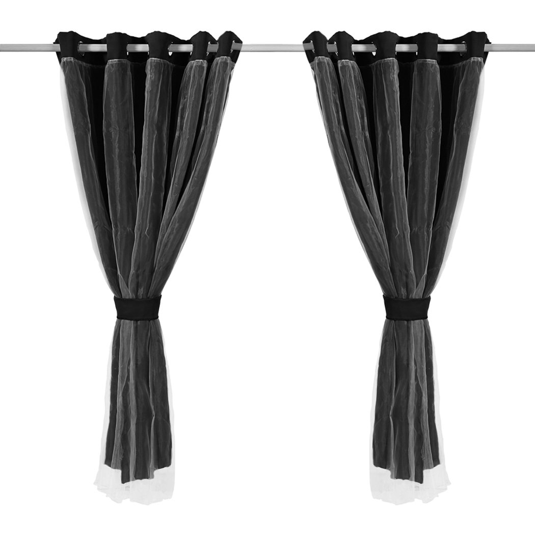 Two elegant blockout curtain panels with gauze, showcasing a modern grommet top design, perfect for room darkening.