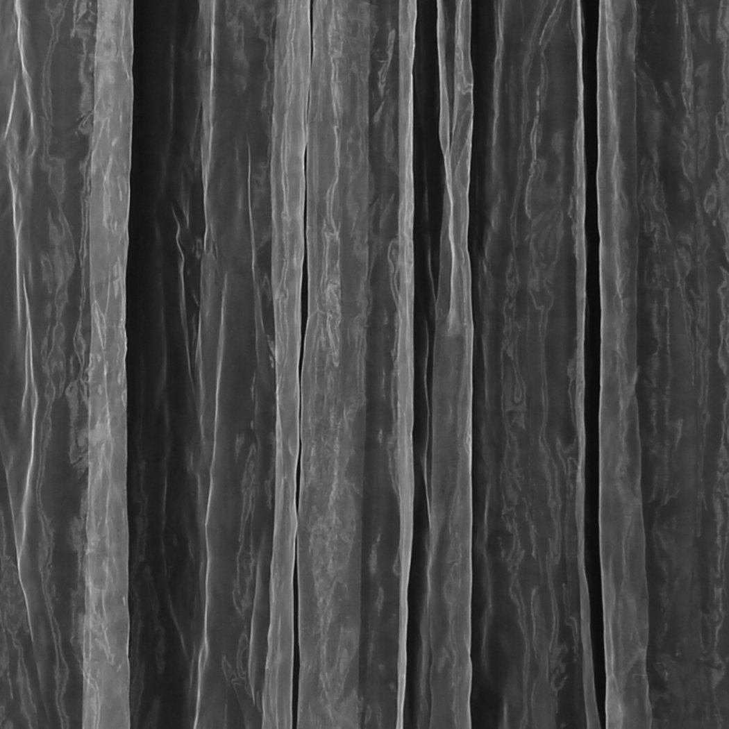 Two elegant blockout curtain panels with gauze, showcasing a rich texture and grommet top for easy hanging.