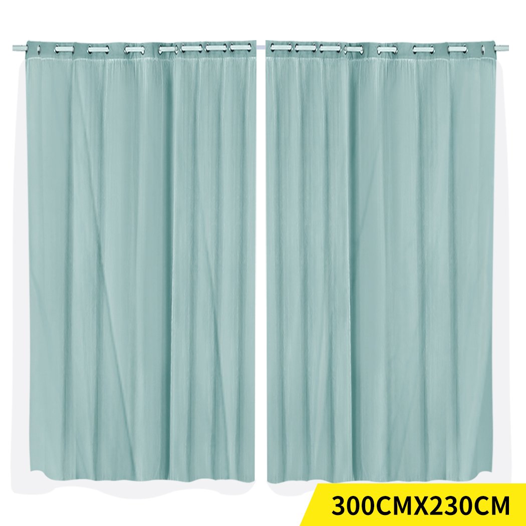 Two elegant blockout curtain panels with gauze, showcasing a modern design and grommet top for easy installation.