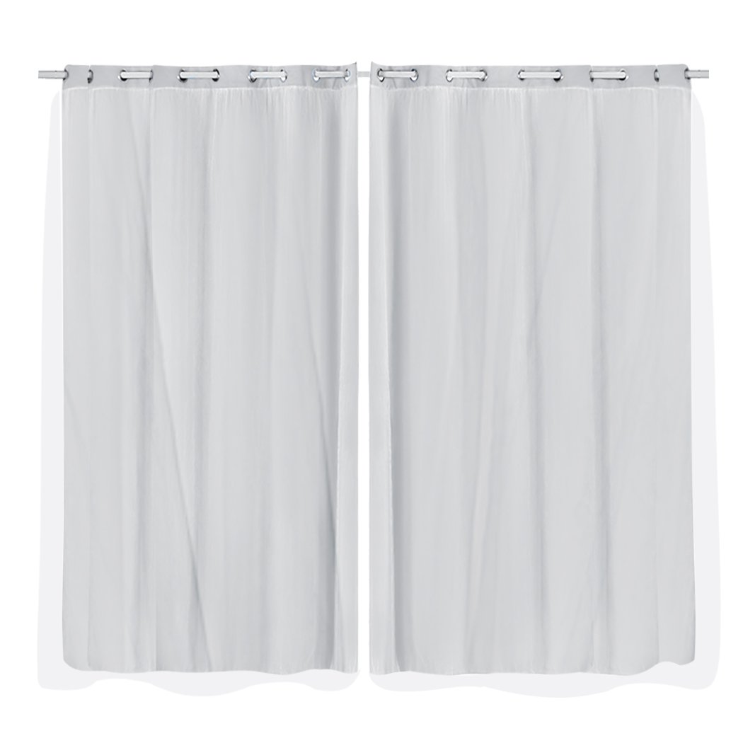 Two elegant blockout curtain panels with gauze, showcasing a rich texture and grommet top for easy hanging.
