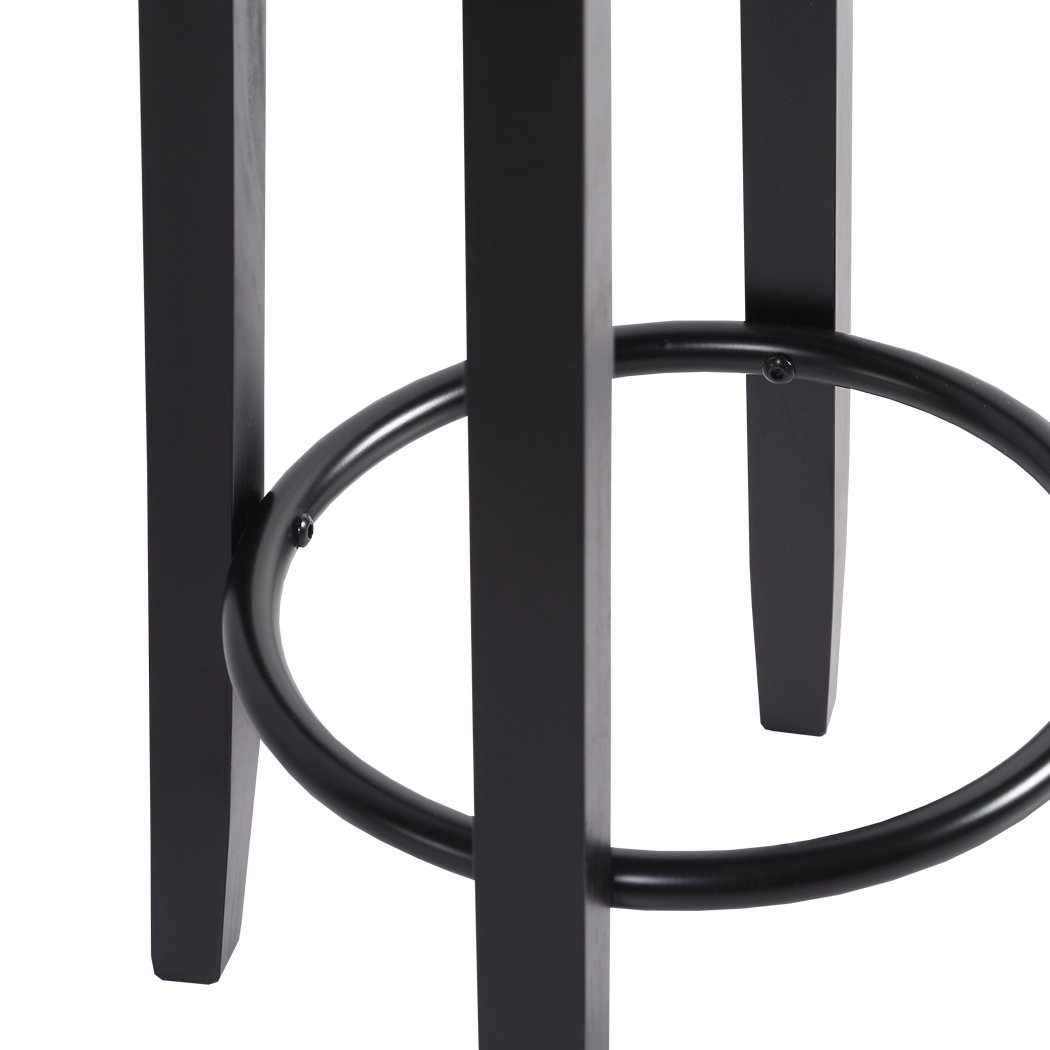 Two Levede 75cm swivel bar stools with solid wood frame and PU leather seat, featuring a bronze-finished footrest.