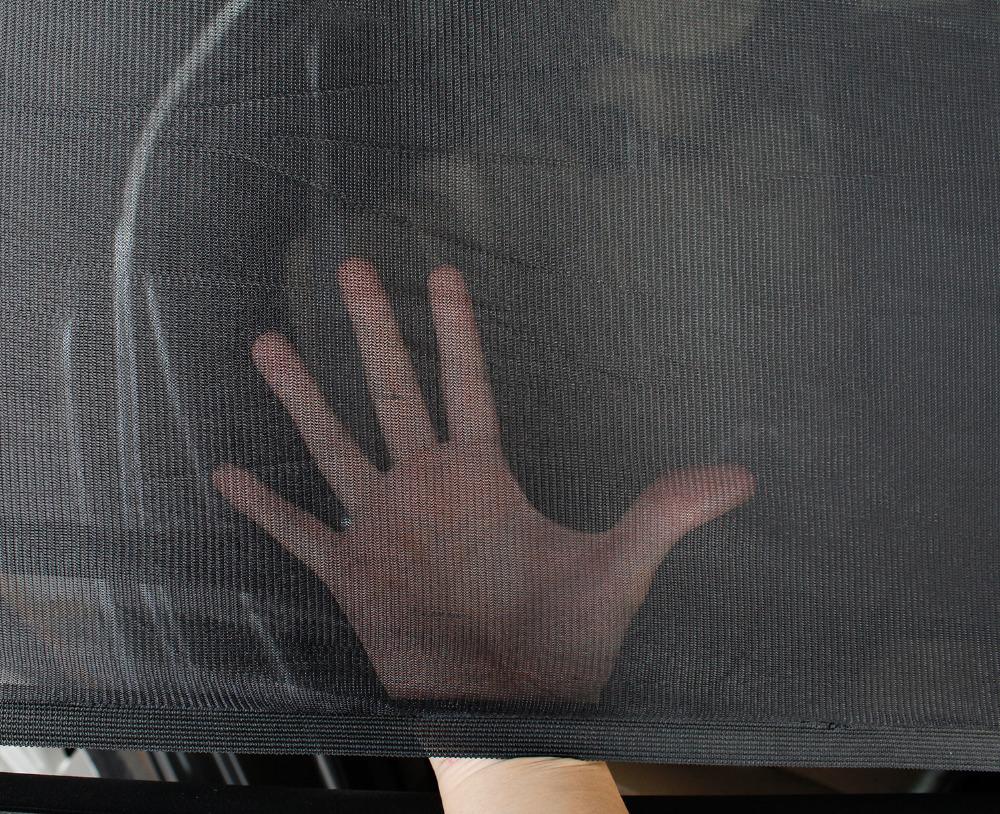 Two universal car sun shades designed for side windows, providing UV protection and a snug fit for rear passenger doors.