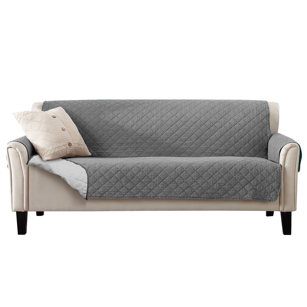 Grey quilted 3 seater sofa cover with microfiber filling, showcasing its stylish design and protective features.