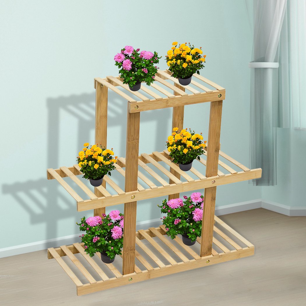 3 Tiers Premium Bamboo Wooden Plant Stand showcasing multiple plants, designed for indoor and outdoor use.