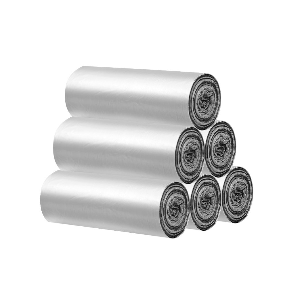 A stack of 300 grey plastic singlet bags with wide handles, ideal for grocery shopping and waste disposal.