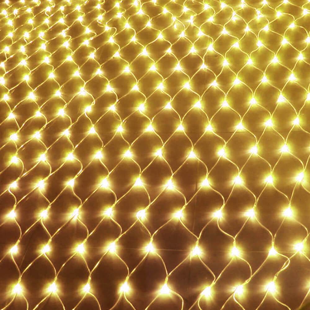 320LED Fairy Lights Net Mesh Curtain in warm white, perfect for festive decorations at weddings and parties.