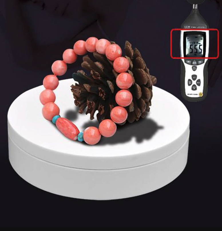 360° Electric Motorized Rotating Display Stand showcasing jewelry with adjustable speed and angles.
