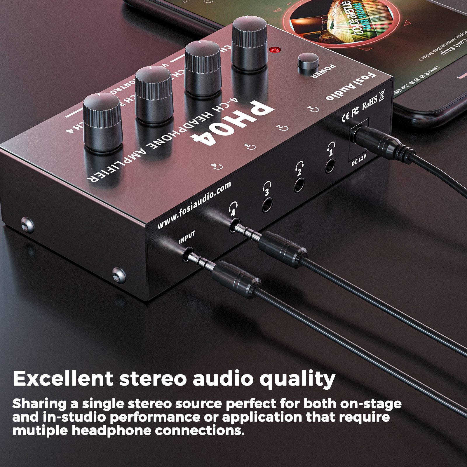 4 Channel Headphone Amplifier in a sleek metal design, showcasing its compact size and multiple headphone outputs.