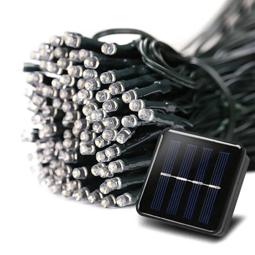 42M 400LED solar-powered fairy lights with warm white glow, perfect for garden and festive decor.