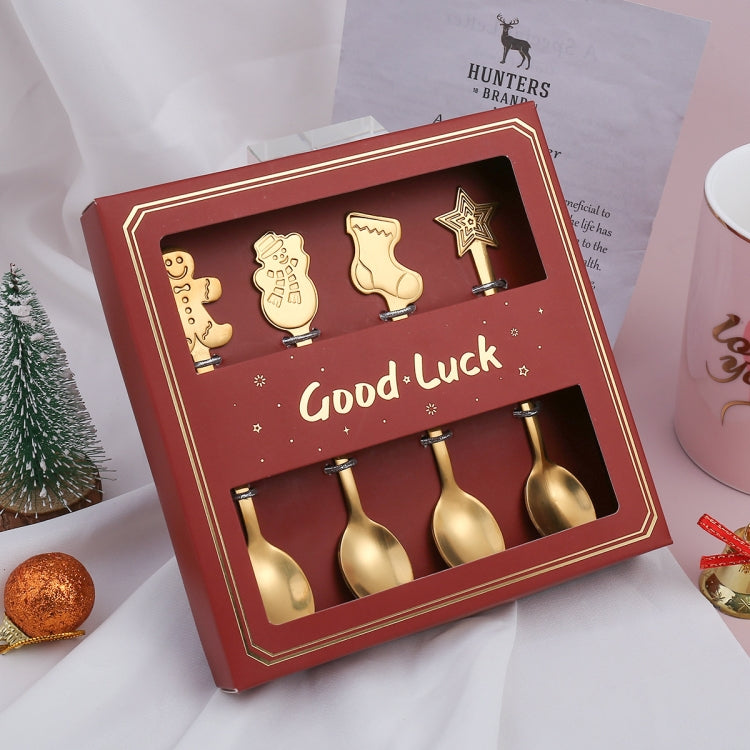 4pcs Christmas stainless steel spoon set featuring festive designs including snowman, stocking, star, and gingerbread.