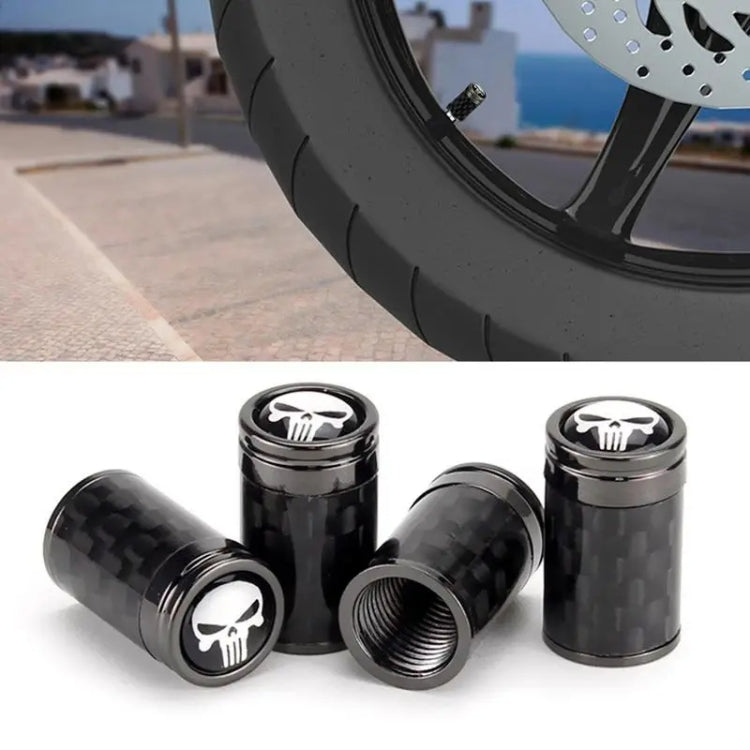 Set of 4 real carbon fibre skeleton tyre valve caps in black, showcasing their sleek design and durable material.