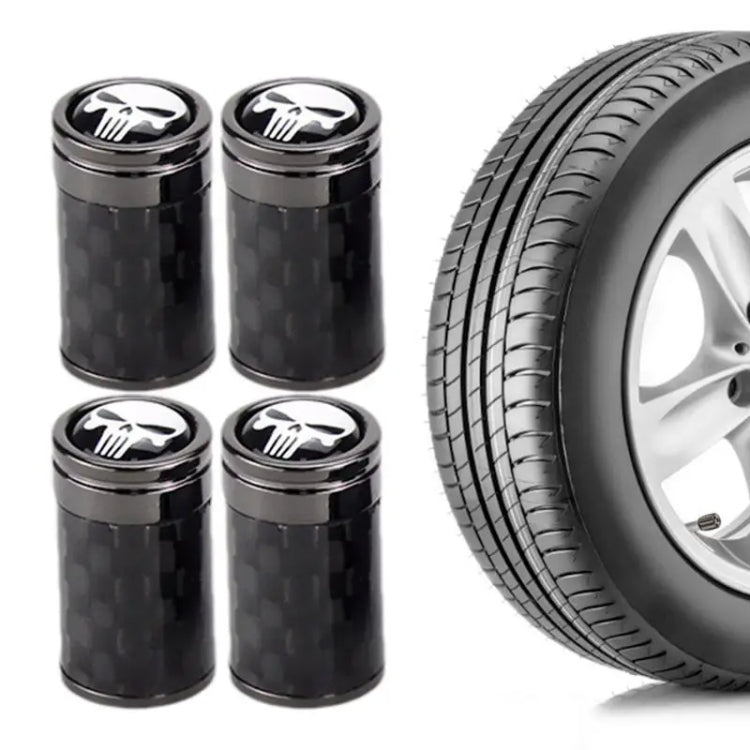 Set of 4 real carbon fibre skeleton tyre valve caps in black, showcasing their sleek design and durable material.