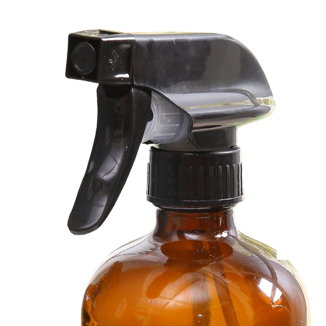 Set of four 500ml amber glass spray bottles with trigger sprayers, ideal for aromatherapy and eco-friendly use.