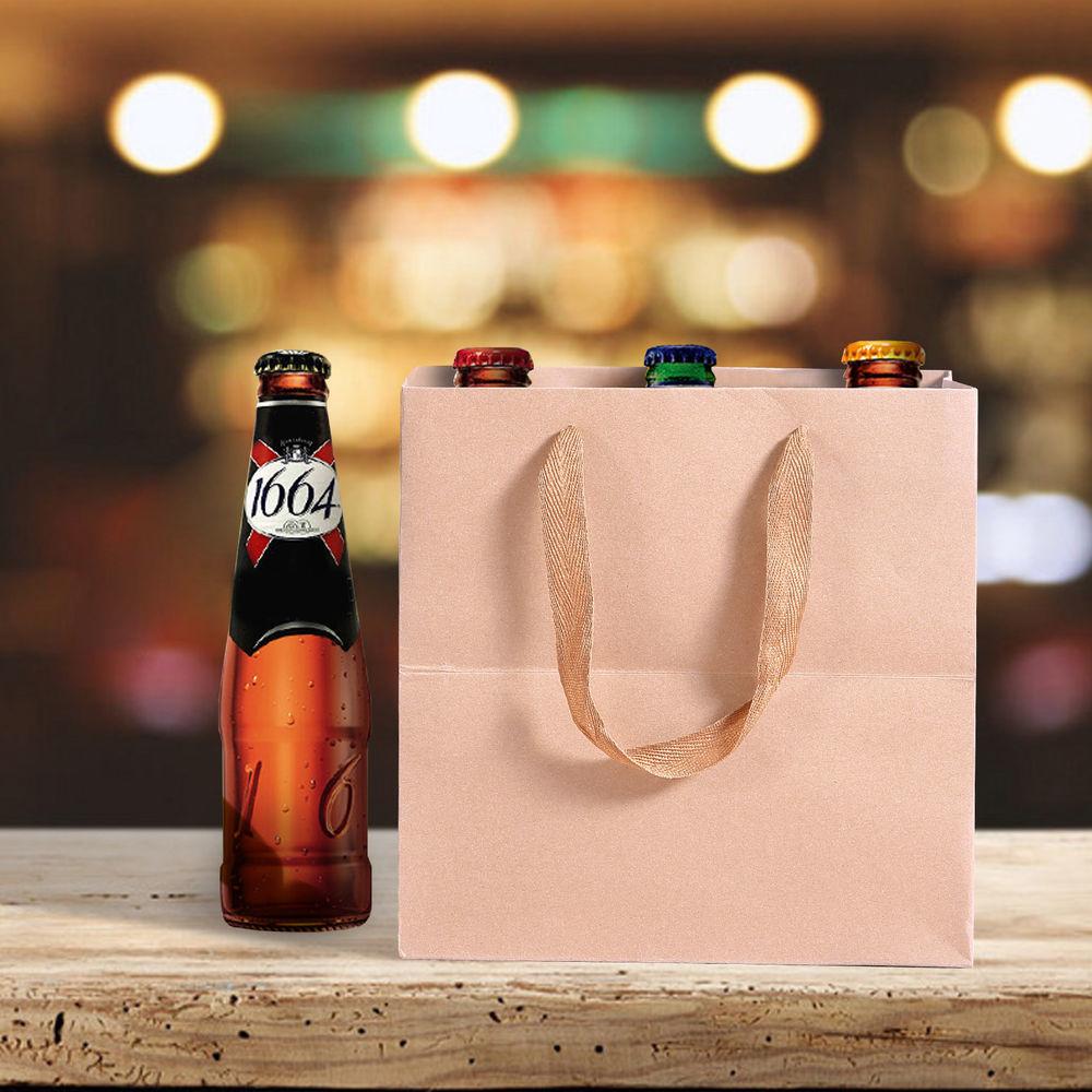 A stack of 50 eco-friendly brown paper bags with twisted handles, ideal for gifts and retail use.
