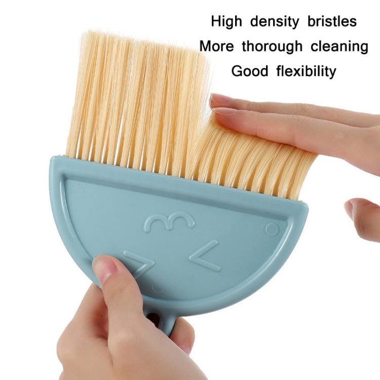 A green mini keyboard cleaning brush set with dustpan, featuring nylon bristles and a compact design for efficient cleaning.