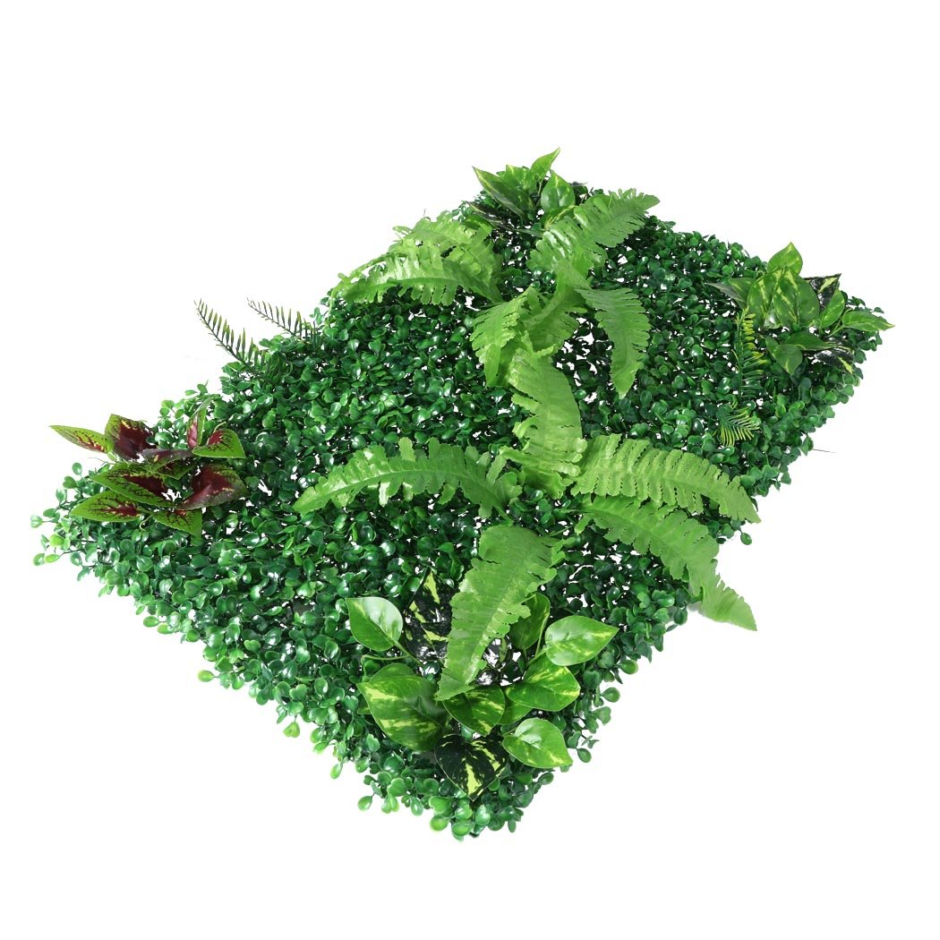 A vibrant green artificial hedge grass plant arranged in a vertical garden style, showcasing realistic foliage for indoor and outdoor decor.
