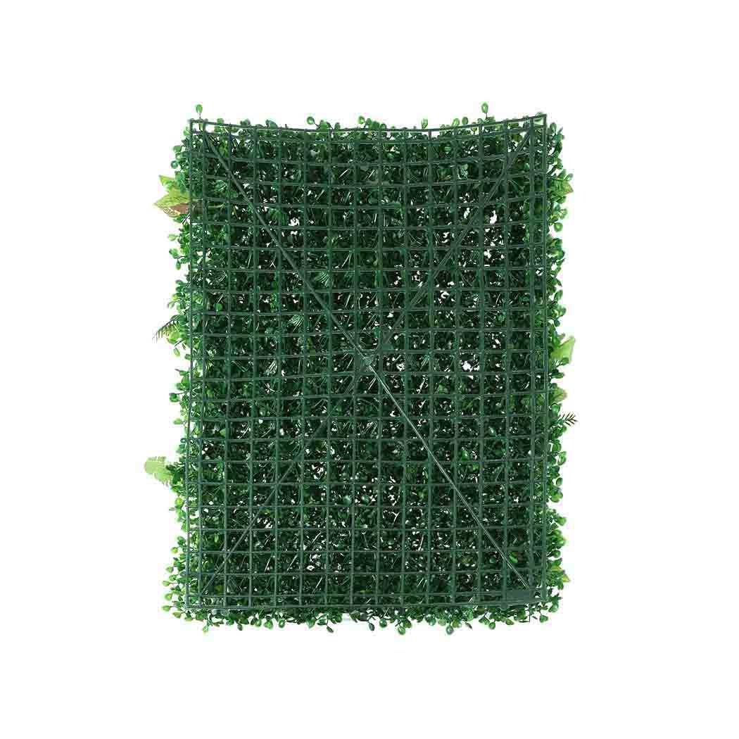 A vibrant green artificial hedge grass plant arranged in a vertical garden style, showcasing realistic foliage for indoor and outdoor decor.
