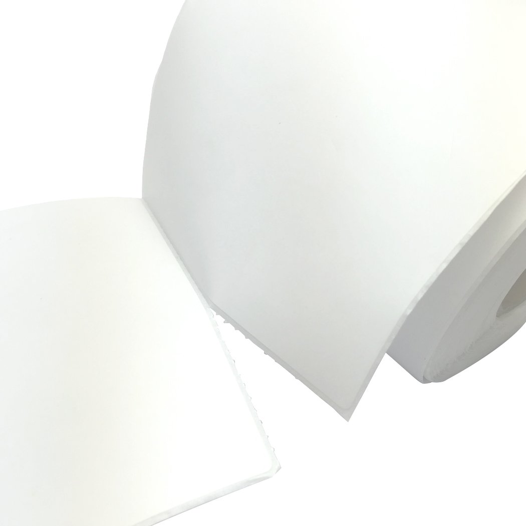 A stack of 600Pcs Direct Thermal Shipping Labels, featuring white paper labels with a strong adhesive, suitable for Fastway eParcel and Startrack.