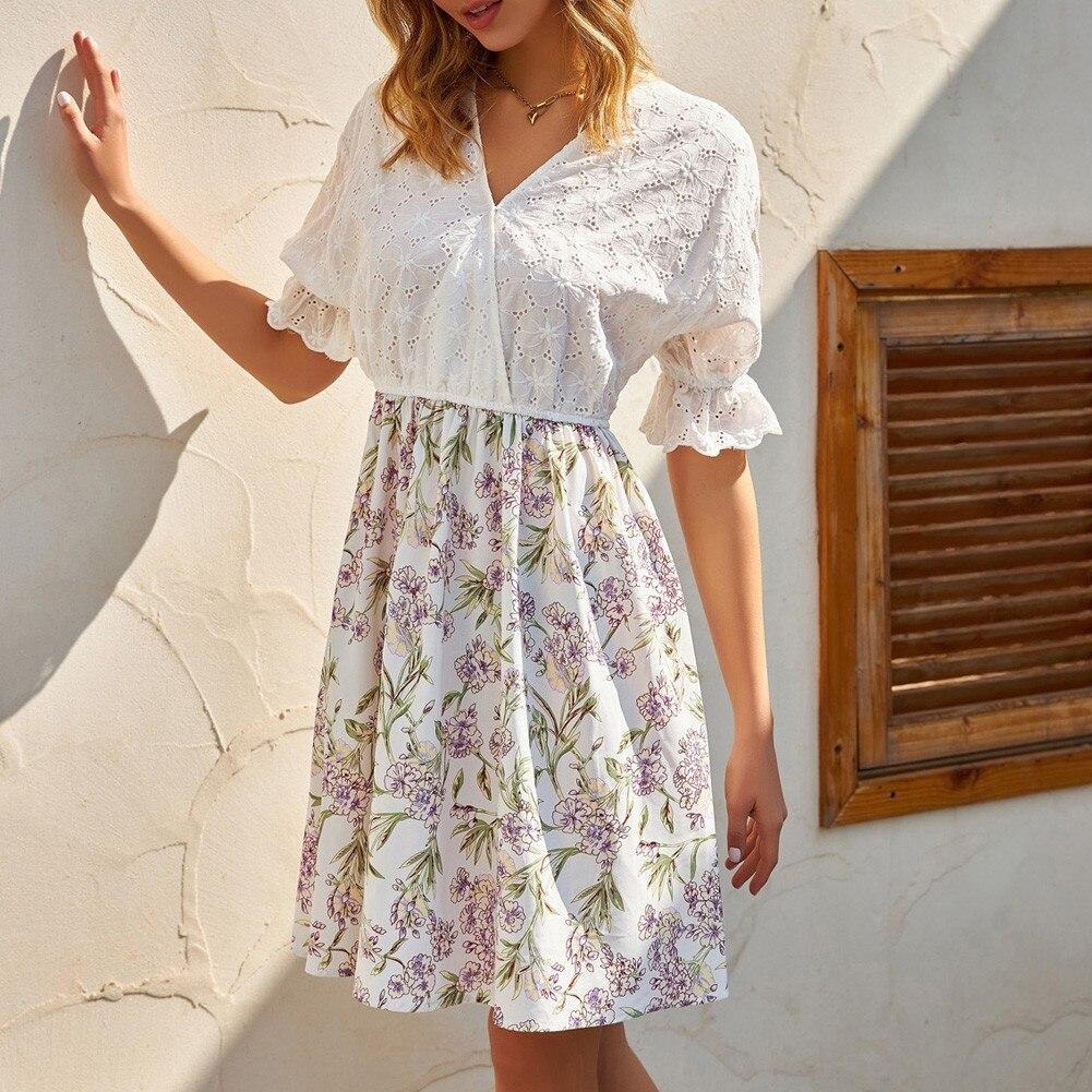 A stylish A Line summer dress featuring a patchwork design, V-neck, and butterfly sleeves, perfect for casual outings.