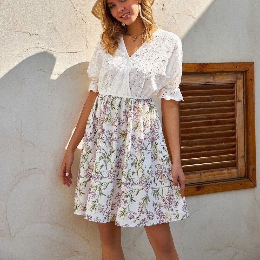 A stylish A Line summer dress featuring a patchwork design, V-neck, and butterfly sleeves, perfect for casual outings.