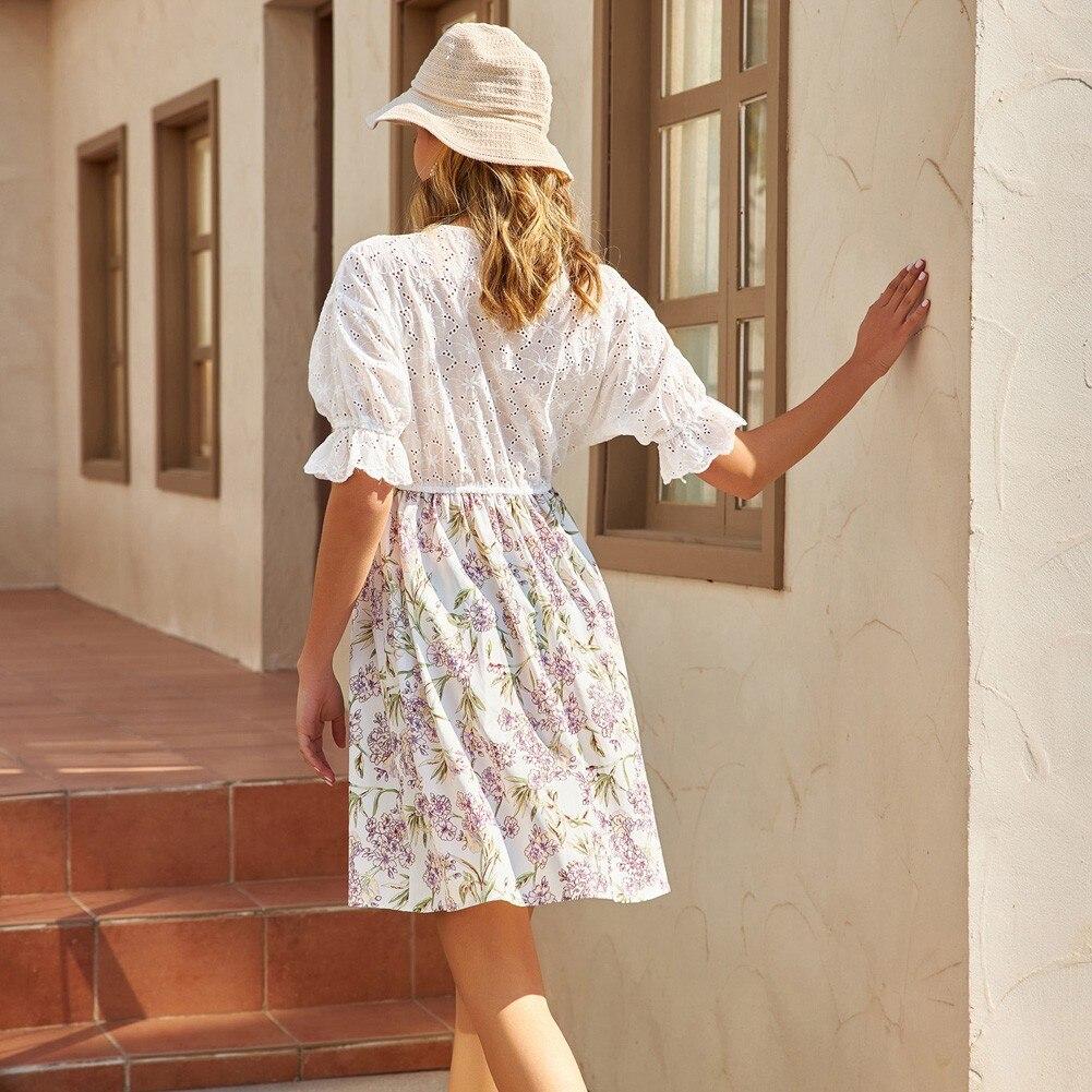 A stylish A Line summer dress featuring a patchwork design, V-neck, and butterfly sleeves, perfect for casual outings.