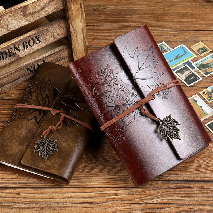 A7 PU Maple Retro Straps Handbook Loose-leaf Notebook in orange with a copper maple leaf pendant and loose-leaf design.