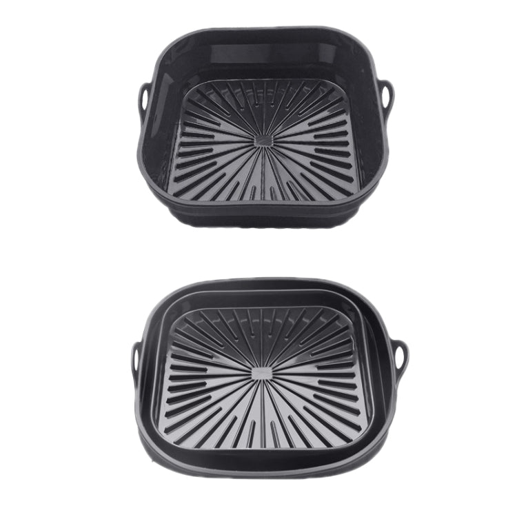 High temperature resistant silicone air fryer grill mat with 3D drainage grooves and double ear handles, perfect for easy cooking and cleaning.
