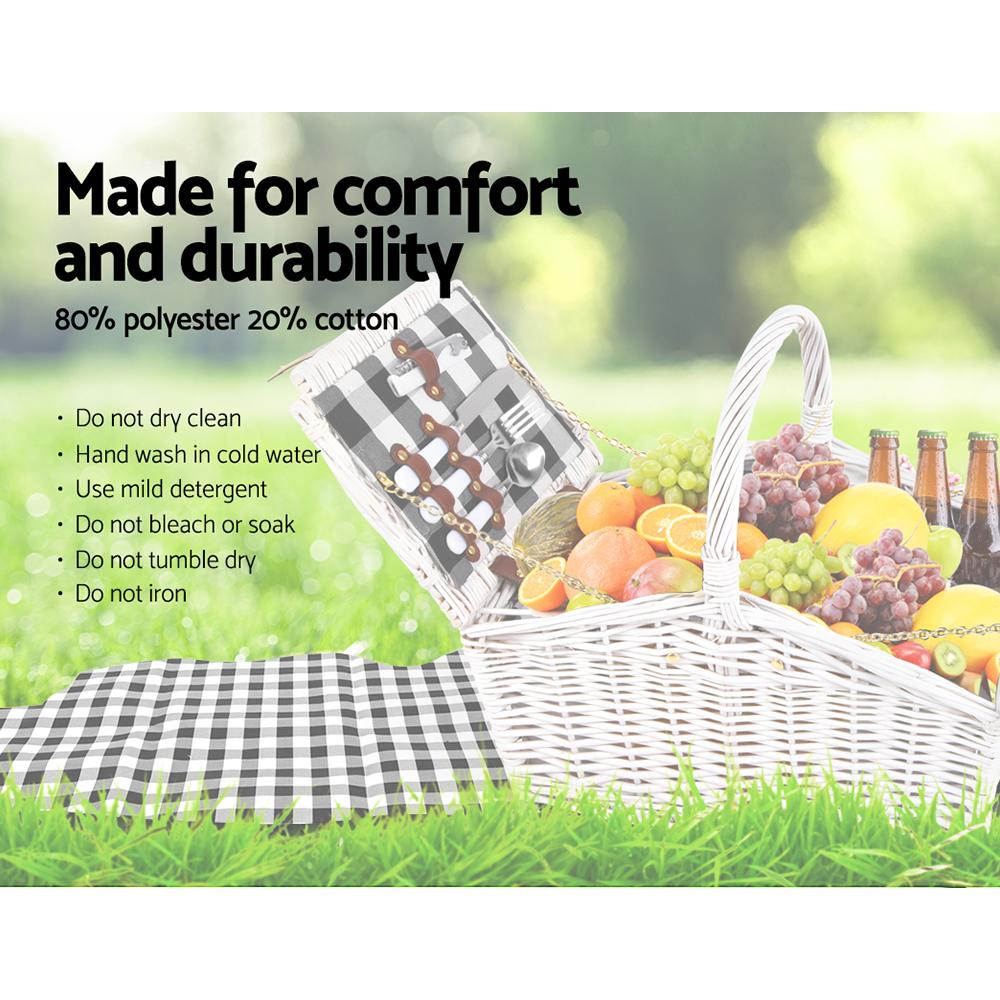 Alfresco 2 Person Picnic Basket with accessories including cutlery, plates, and a matching blanket, perfect for outdoor dining.