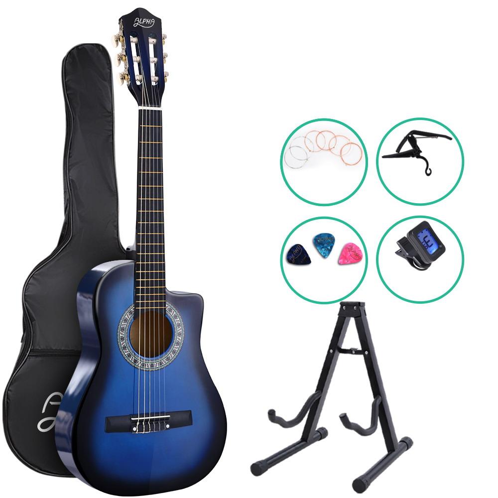 Alpha 34-inch Classical Acoustic Guitar in blue with accessories including picks, tuner, capo, and carry bag.