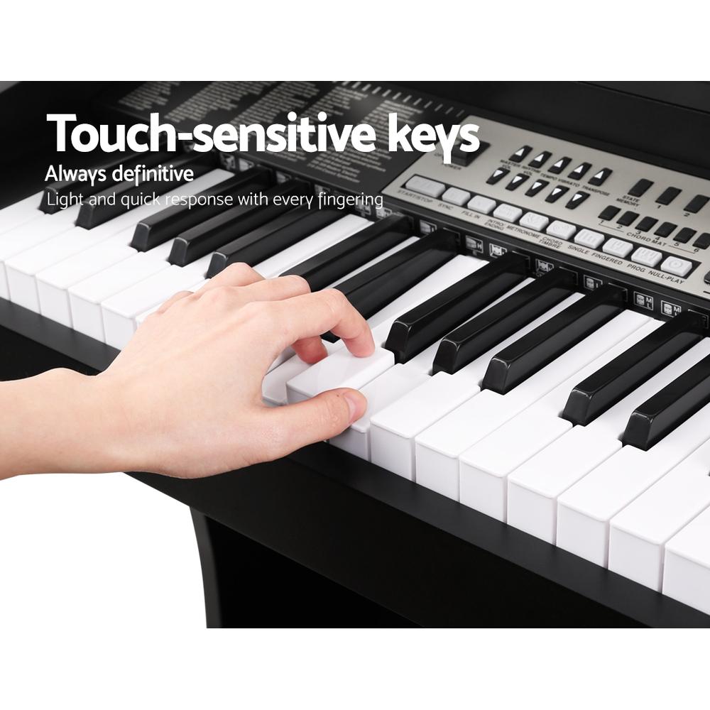 Alpha 61 Key Electronic Piano Keyboard with touch-sensitive keys and stylish design, featuring a keyboard holder and music stand.