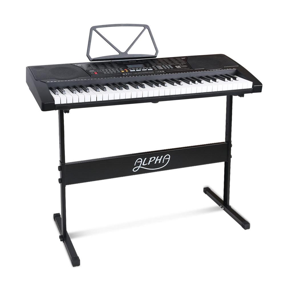 Alpha 61-Key Lighted Electronic Piano Keyboard with LCD display and adjustable stand, showcasing lighted keys and various input options.