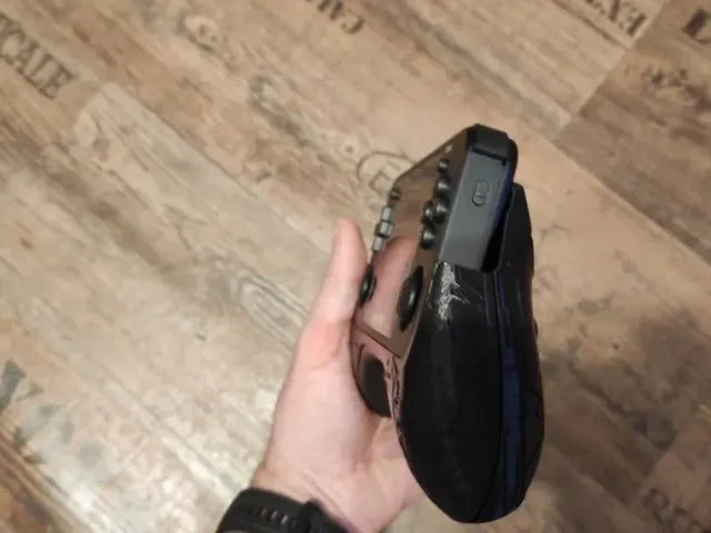 Anbernic RG351MP Game Pad 'Epic ULTRA' in black with stylish circuit pattern and Anbernic logo.