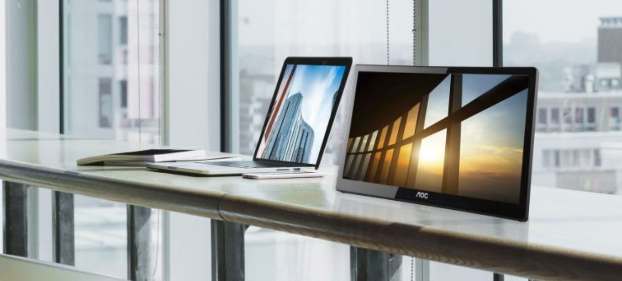 AOC 15.6-inch IPS monitor with USB 3.0 connection, showcasing a vibrant Full HD display and foldable stand.