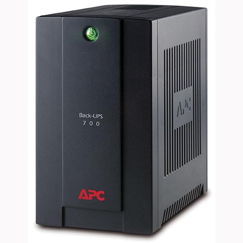 APC BX700U-AZ UPS unit with black casing, showcasing LED display and multiple output connections.